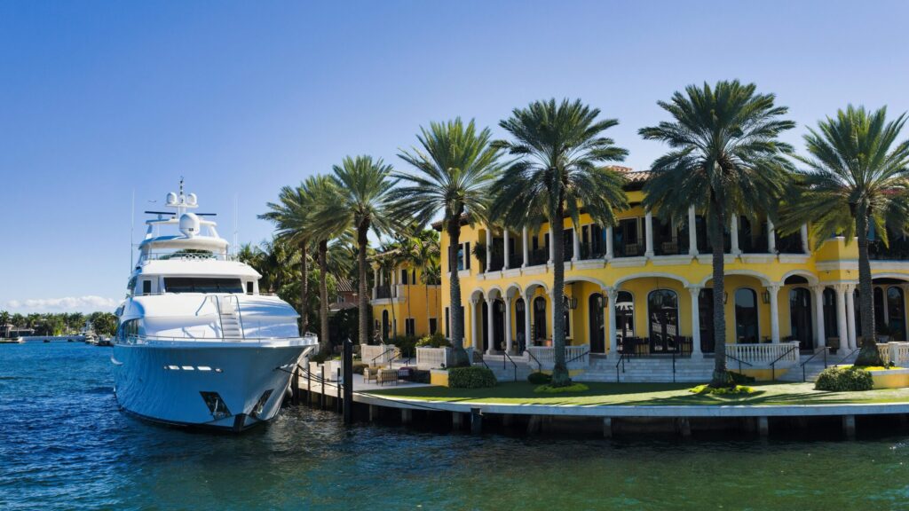 luxury yacht moored by residence